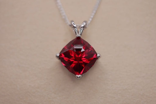 Necklace with a synthetic ruby