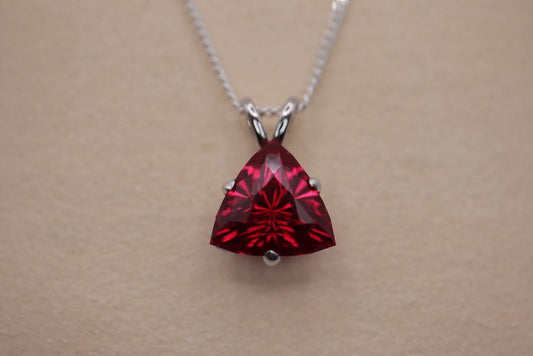 Necklace with a synthetic ruby