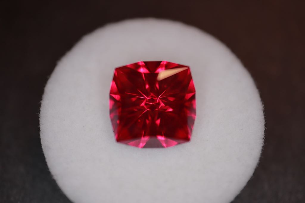 Necklace with a synthetic ruby