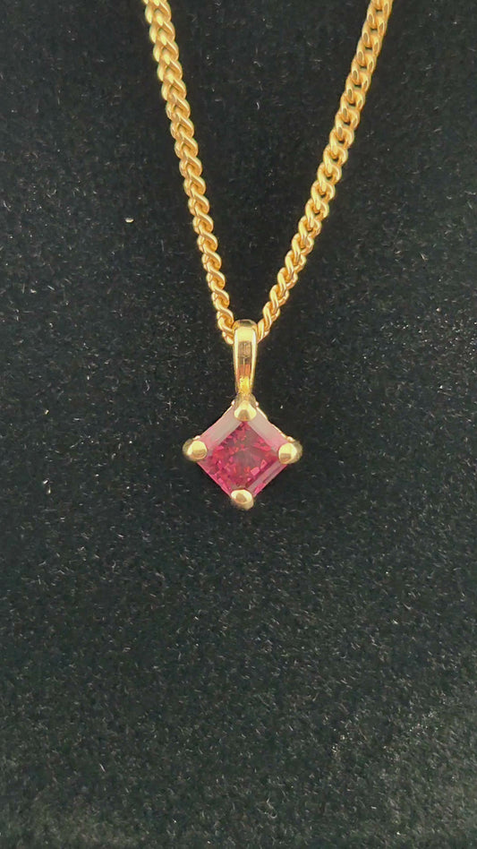 14k pendant with a new find garnet