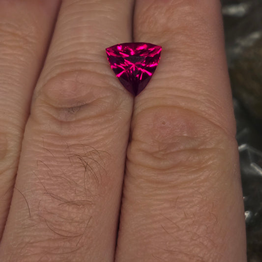 Necklace with a synthetic ruby